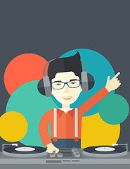 Image showing DJ with console.