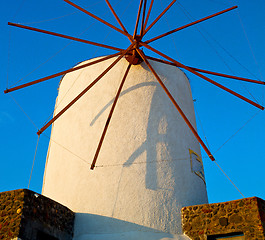 Image showing old mill in santorini greece europe  and the sky sunrise