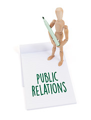 Image showing Wooden mannequin writing - Public relations