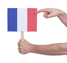 Image showing Hand holding small card - Flag of France