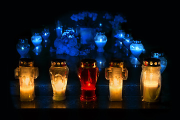 Image showing Candles Burning At a Cemetery