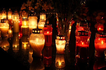 Image showing Candles Burning At a Cemetery