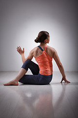 Image showing Sporty fit yogini woman practices yoga asana