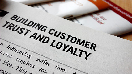 Image showing Buiding customer trust and loyalty word on a book