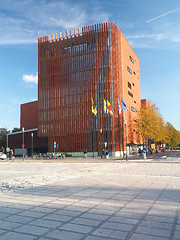 Image showing editorial  A modern office building is seen in by an outdoor squ