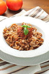 Image showing 
Homemade pasta topped with tomato and Parmesan integral