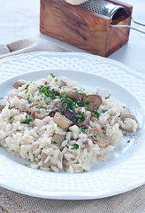 Image showing 
Pasta and rice with porcini mushrooms served with butter and pa