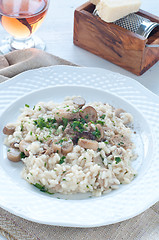 Image showing 
Pasta and rice with porcini mushrooms served with butter and pa