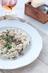 Image showing 
Pasta and rice with porcini mushrooms served with butter and pa