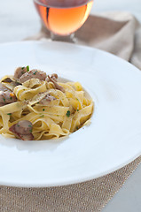 Image showing 
Pasta and rice with porcini mushrooms served with butter and pa