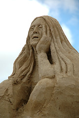 Image showing Sad sand woman