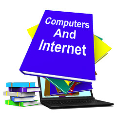Image showing Computers And Internet Book Stack Laptop Shows Web Research