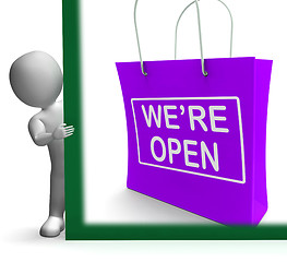 Image showing We\'re Open Shopping Bag Sign Shows New Store Launch