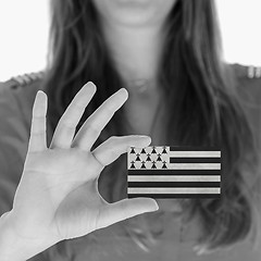 Image showing Woman showing a blank business card