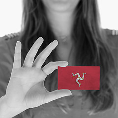 Image showing Woman showing a blank business card