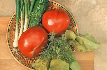Image showing Fresh vegetables: tomatoes, cucumbers, onions, lettuce.