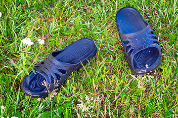 Image showing Shoes for beach activities on the river, in the countryside.