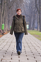 Image showing Teenager walking in a park