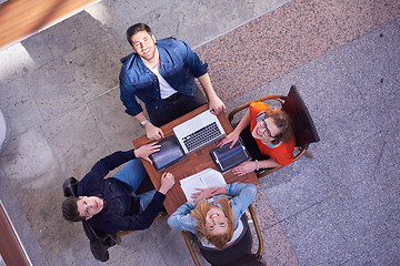 Image showing students group working on school  project  together