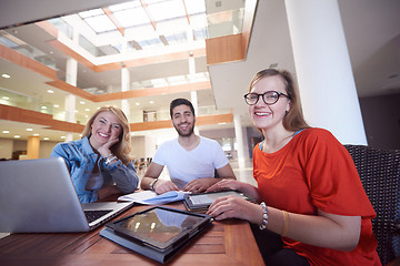 Image showing students group working on school  project  together