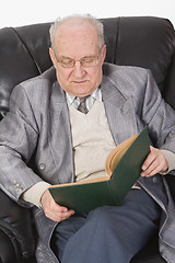 Image showing Senior reading a book