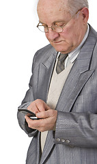 Image showing Senior man using a mobile phone