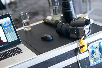 Image showing medium format photo camera connected to laptop computer