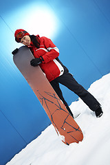 Image showing young adult female snowboarder