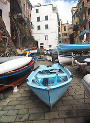 Image showing Riomaggiore   Cinque Terre Italy  old fishing boats on street wi