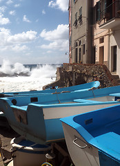 Image showing Riomaggiore Cinque Terre old fishing boats on street with histor