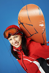 Image showing young adult female snowboarder