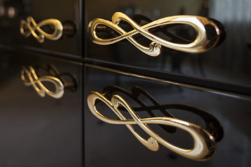 Image showing gold furniture handles