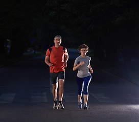 Image showing couple jogging at early morning