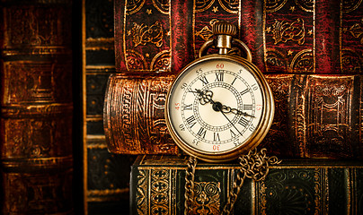 Image showing Old Books and Vintage pocket watch