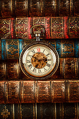 Image showing Old Books and Vintage pocket watch