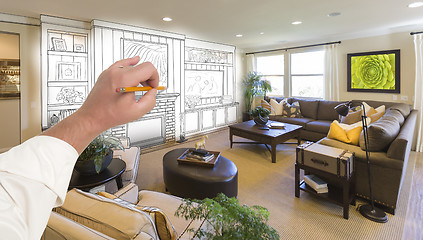 Image showing Male Hand Drawing Entertainment Center Over Photo of Home Interi