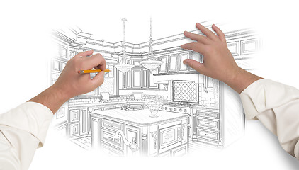 Image showing Male Hands Sketching Beautiful Custom Kitchen