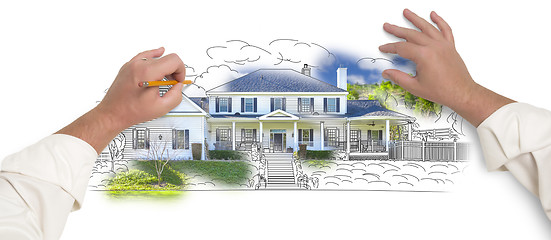 Image showing Male Hands Sketching House with Photo Showing Through