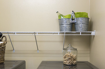 Image showing Laundry Room with Buckets and Jar of Clothes Pins