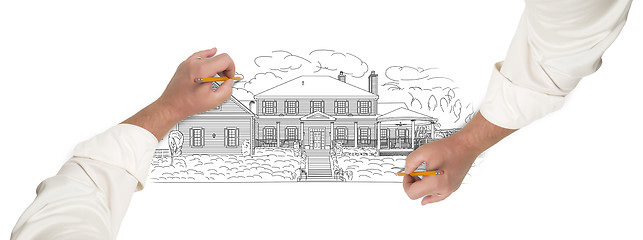 Image showing Male Hands Sketching A Beautiful House