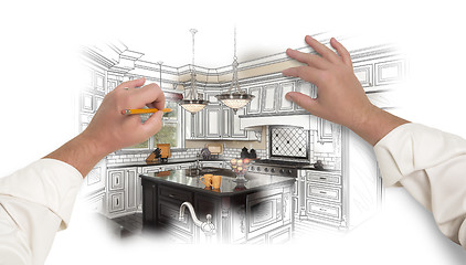 Image showing Male Hands Sketching Custom Kitchen with Photo Showing Through