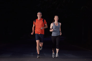 Image showing couple jogging at early morning