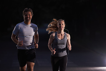 Image showing couple jogging at early morning