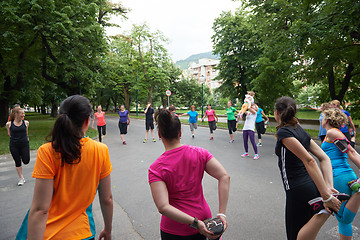 Image showing jogging people group stretching