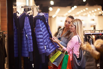 Image showing happy young girls in  shopping mall