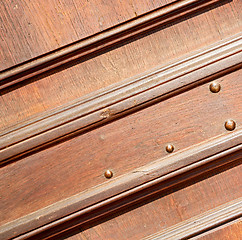 Image showing door    in italy old ancian wood and traditional  texture nail