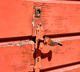 Image showing door    in italy old ancian wood and traditional  texture nail