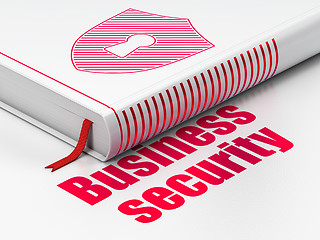 Image showing Privacy concept: book Shield With Keyhole, Business Security on white background