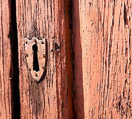 Image showing door    in italy old ancian wood and traditional  texture nail