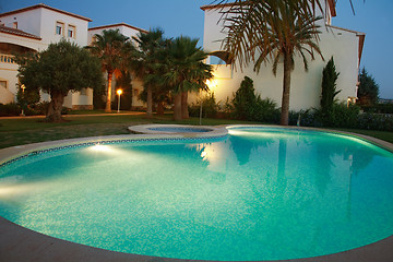 Image showing Villas with swimming pool by night